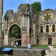 Tourists visiting the Orval Abbey ruins, a Cistercian monastery founded in 1132 in the Ardennes, Belgium